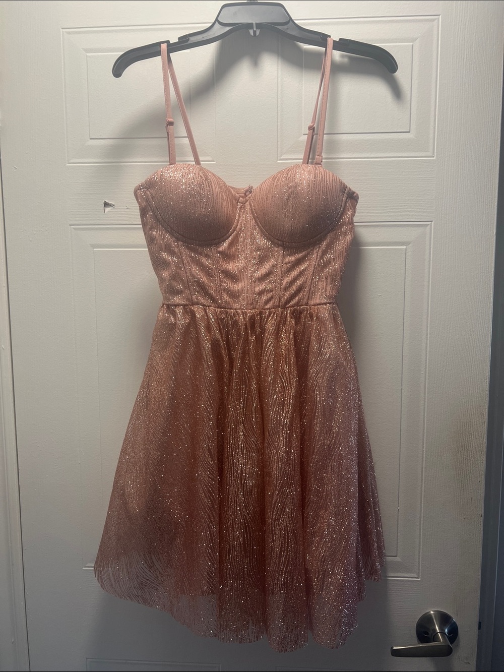 Le chateau tags on strapless sparkly dress